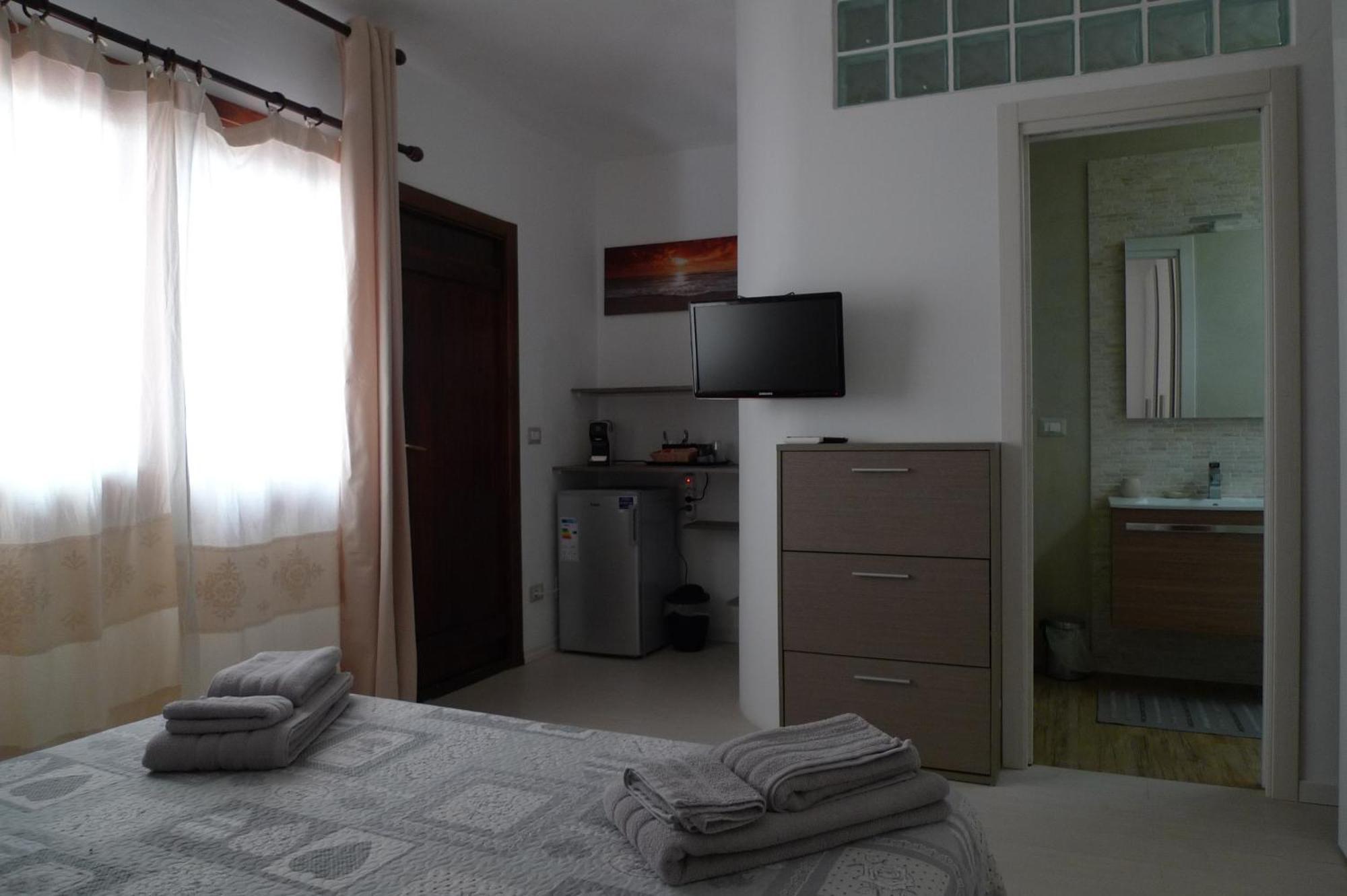 Villaggio Est Affittacamere San Teodoro  Bilik gambar